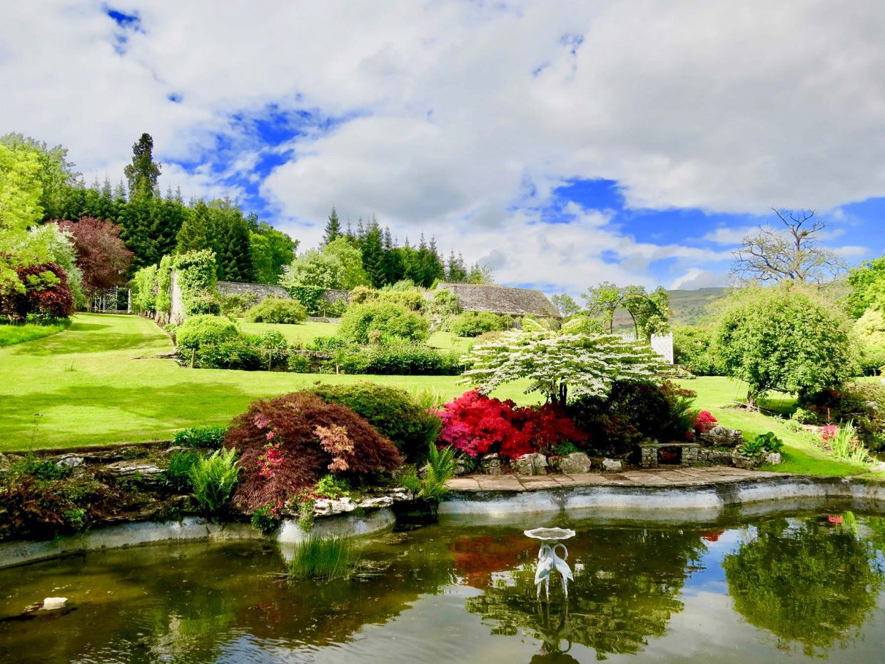 penmyarth ponds with view of pool and potting shed