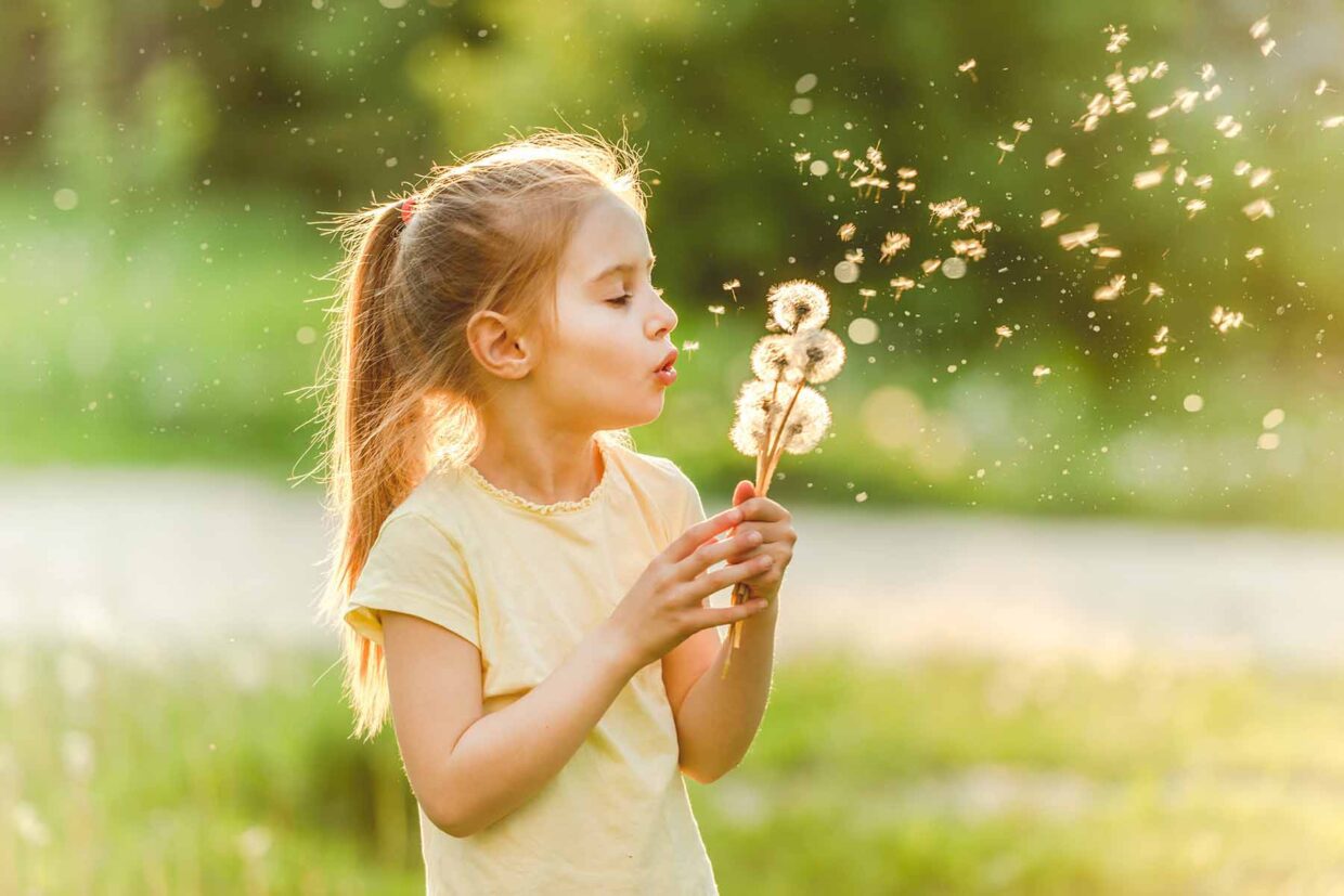 Image shows ah Girl playing outside